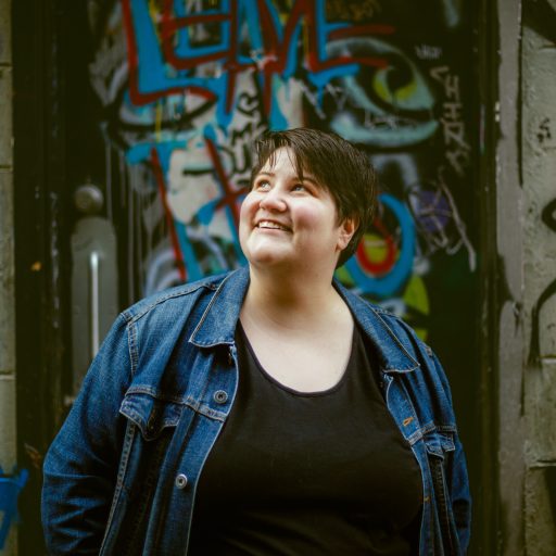 A picture of Veronica Dymond, a white woman with short brown hair smiling and wearing a jean jacket.

Credit: Kevin Coffey